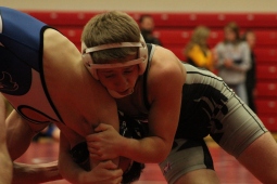 Junior Jacob Laughlin tries to gain leverage against his opponent.