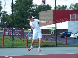 Sophomore Evan Thompson hits a forehand